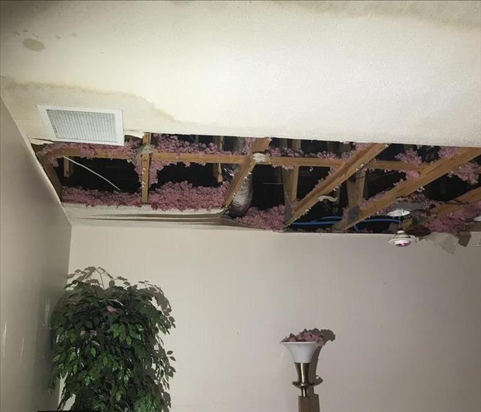 ceiling damaged by water, demolition showing insulation